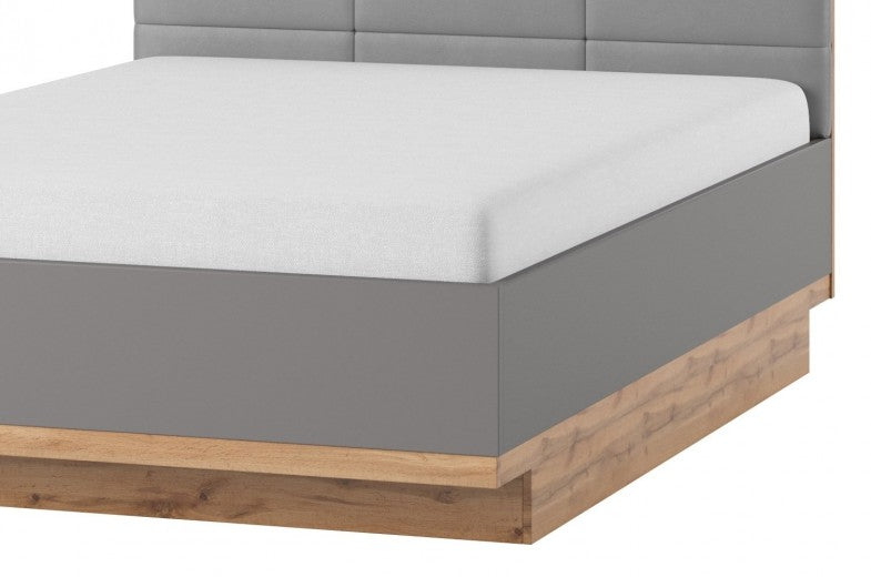 Lit avec tête de lit rembourrée en cuir écologique Livorno 66 Gris